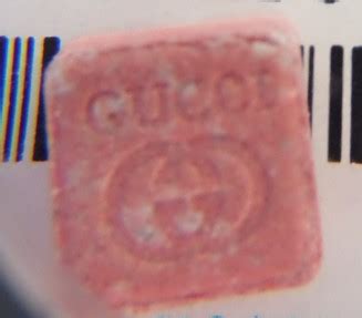 pink mdma pill versace logo|Pink 'Gucci' ecstasy pill containing four times the average dose of .